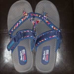 Navy, gray, and multi color Skechers